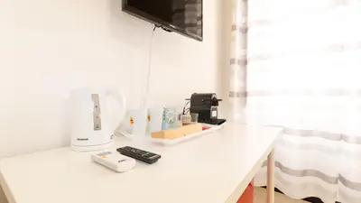 TV o dispositivi per l'intrattenimento presso Affittacamere Juighissa Leonora