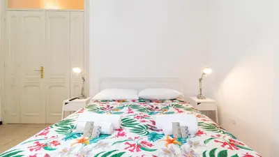 Letto o letti in una camera di Affittacamere Juighissa Leonora
