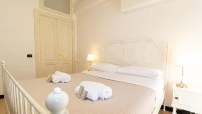 Letto o letti in una camera di Affittacamere Juighissa Leonora