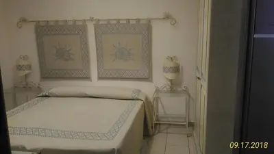 Letto o letti in una camera di B&B Madau