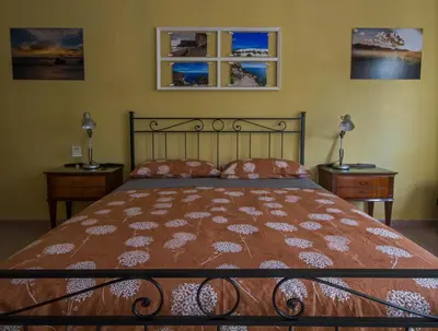 Letto o letti in una camera di B&B la Bitta