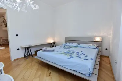 Letto o letti in una camera di Casa Viola, splendido soggiorno sul mare
