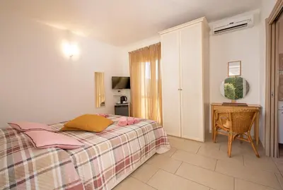 Letto o letti in una camera di LeCalleBed-Breakfast