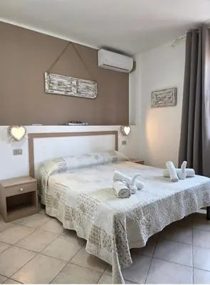 Letto o letti in una camera di Il Melangolo