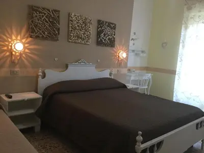 Letto o letti in una camera di Il Melangolo