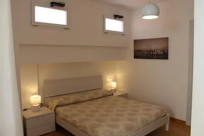 Letto o letti in una camera di Patrizio Home