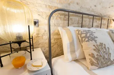 Letto o letti in una camera di Via San Giacomo 10