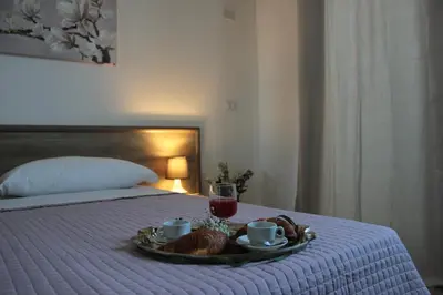 Letto o letti in una camera di Mansio Residence & Hotel