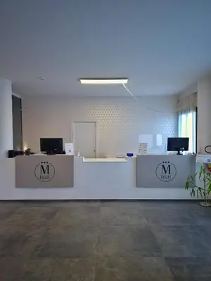 TV o dispositivi per l'intrattenimento presso Mansio Residence & Hotel