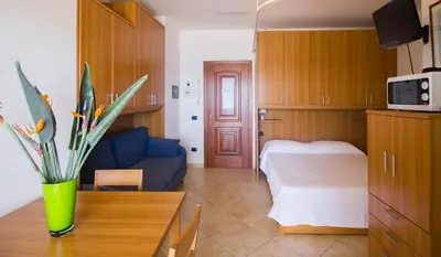 Letto o letti in una camera di Due Mari Residence