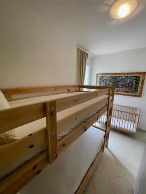 Letto o letti in una camera di I Giardini di Pula 