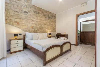 Letto o letti in una camera di Arcobaleno Rooms
