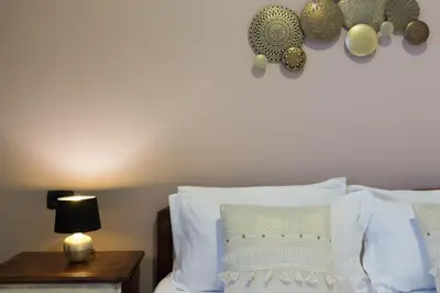 Letto o letti in una camera di Arcobaleno Rooms