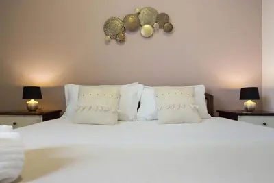 Letto o letti in una camera di Arcobaleno Rooms