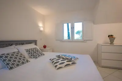 Letto o letti in una camera di Sul Mare Sardegna Villa Criside