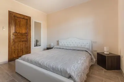 Letto o letti in una camera di Anaelehouserooms LTB