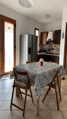 Cucina o angolo cottura di Villetta bordo piscina vista mare Wi-Fi Gratis