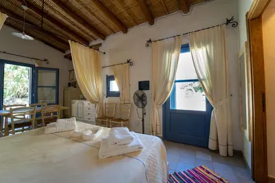 Letto o letti in una camera di Residence Isola dei Mori
