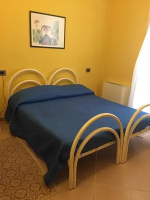 Letto o letti in una camera di The Orange House
