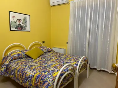 Letto o letti in una camera di The Orange House