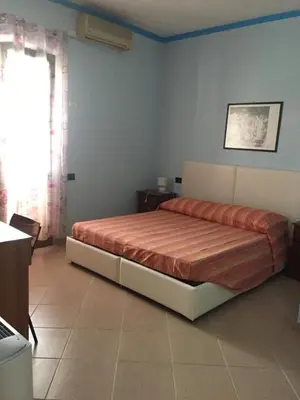 Letto o letti in una camera di The Orange House