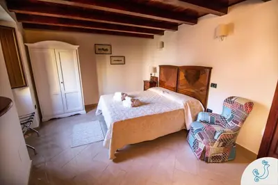 Letto o letti in una camera di Manno 81 - Charming historic apartment