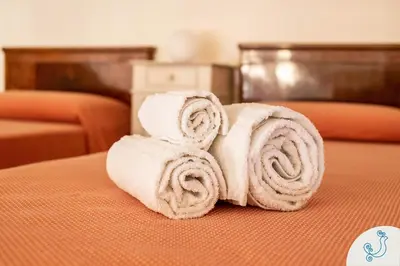 Letto o letti in una camera di Manno 81 - Charming historic apartment