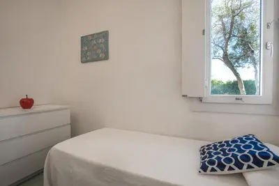 Letto o letti in una camera di Sul Mare Sardegna Villa Nesea