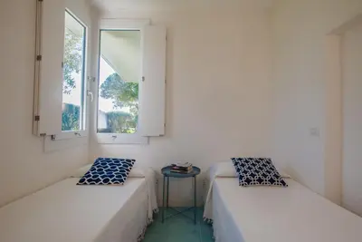 Letto o letti in una camera di Sul Mare Sardegna Villa Nesea