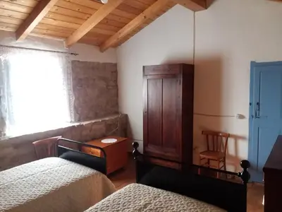 Letto o letti in una camera di Casa museo 