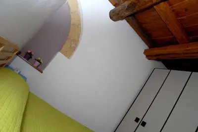 Letto o letti in una camera di Antica Dimora I Dragoni