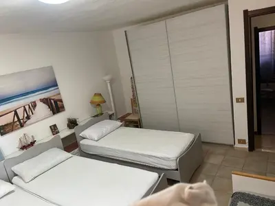 Letto o letti in una camera di CALA SINZIAS, 150 mt dalla splendida spiaggia