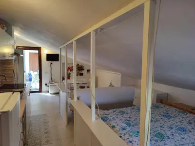 Letto o letti in una camera di Ulivo