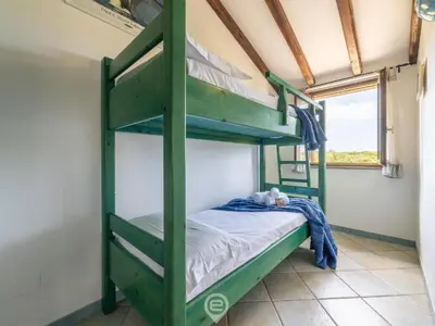 Letto o letti in una camera di Casa di Greta