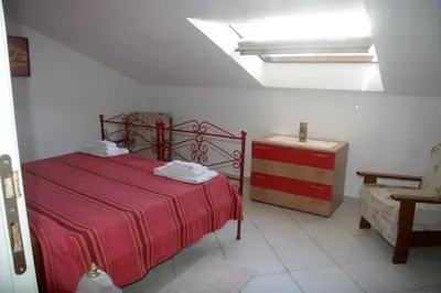 Letto o letti in una camera di La brezza del Sud