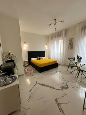 Letto o letti in una camera di Central home Cagliari
