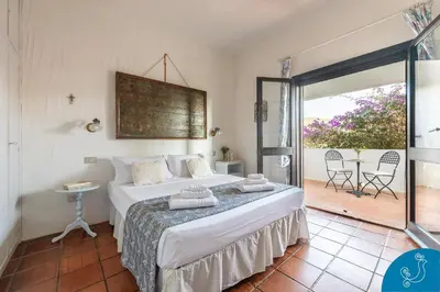 Letto o letti in una camera di Dimora Caterina - Exclusive villa with sea view
