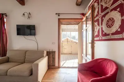 Area soggiorno di Corte Cristina & Suites