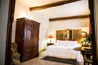 Letto o letti in una camera di Corte Cristina & Suites