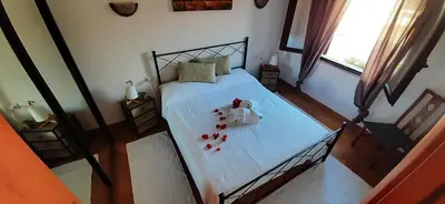 Letto o letti in una camera di VILLA IBISCO