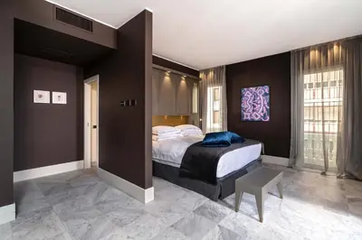 Letto o letti in una camera di Palazzo Doglio