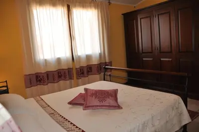 Letto o letti in una camera di Villa Eva Luxury Villasimius