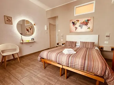 Letto o letti in una camera di Sweet Rooms Cagliari