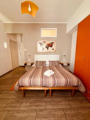 Letto o letti in una camera di Sweet Rooms Cagliari