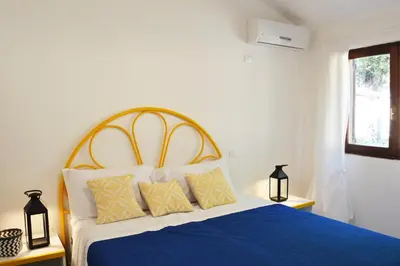 Letto o letti in una camera di CASE BELVEDERE