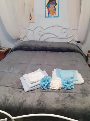Letto o letti in una camera di Casa Blu oltremare