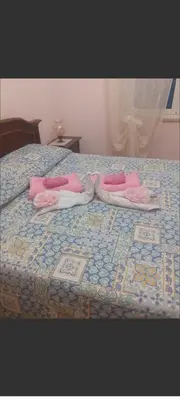Letto o letti in una camera di Casa Blu oltremare
