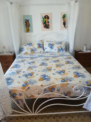 Letto o letti in una camera di Casa Blu oltremare