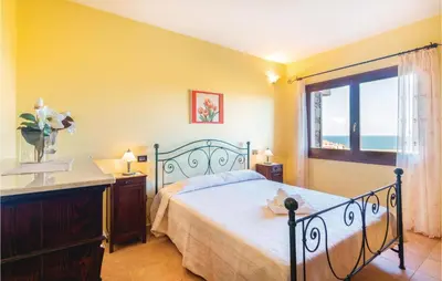 Letto o letti in una camera di La Duna E Il Blu