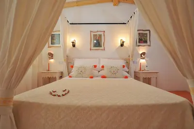 Letto o letti in una camera di HOTEL ORLANDO Sardegna